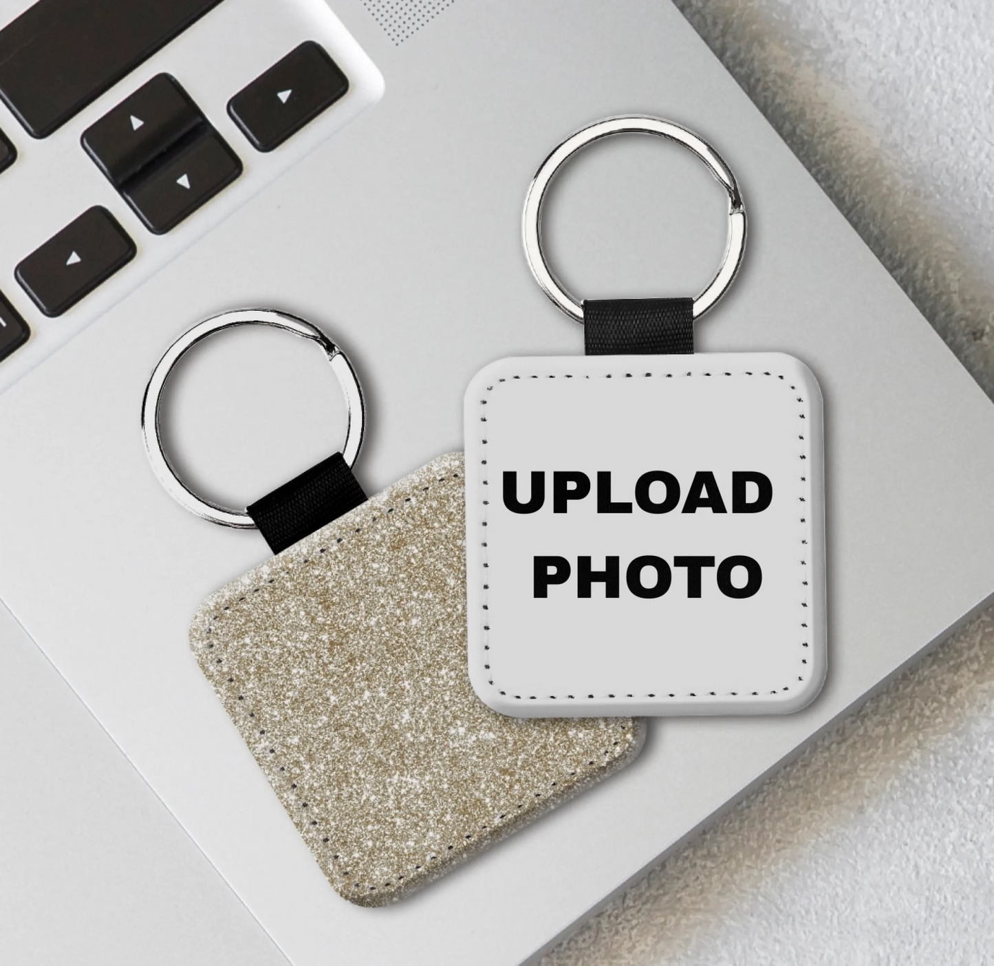 Gold glitter square PU leather keychain customized with photos, logos, names, and artwork.