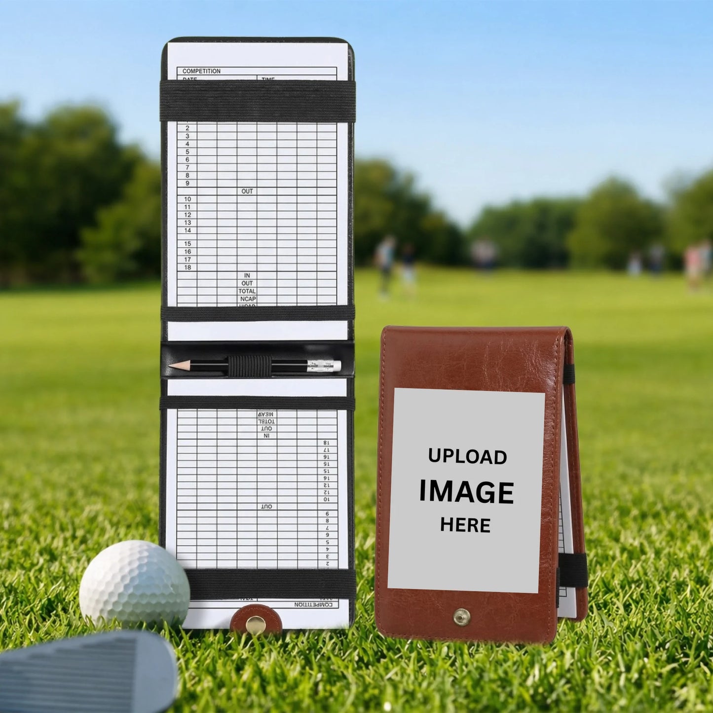 Golf scorecard holder with golf ball and club on grass