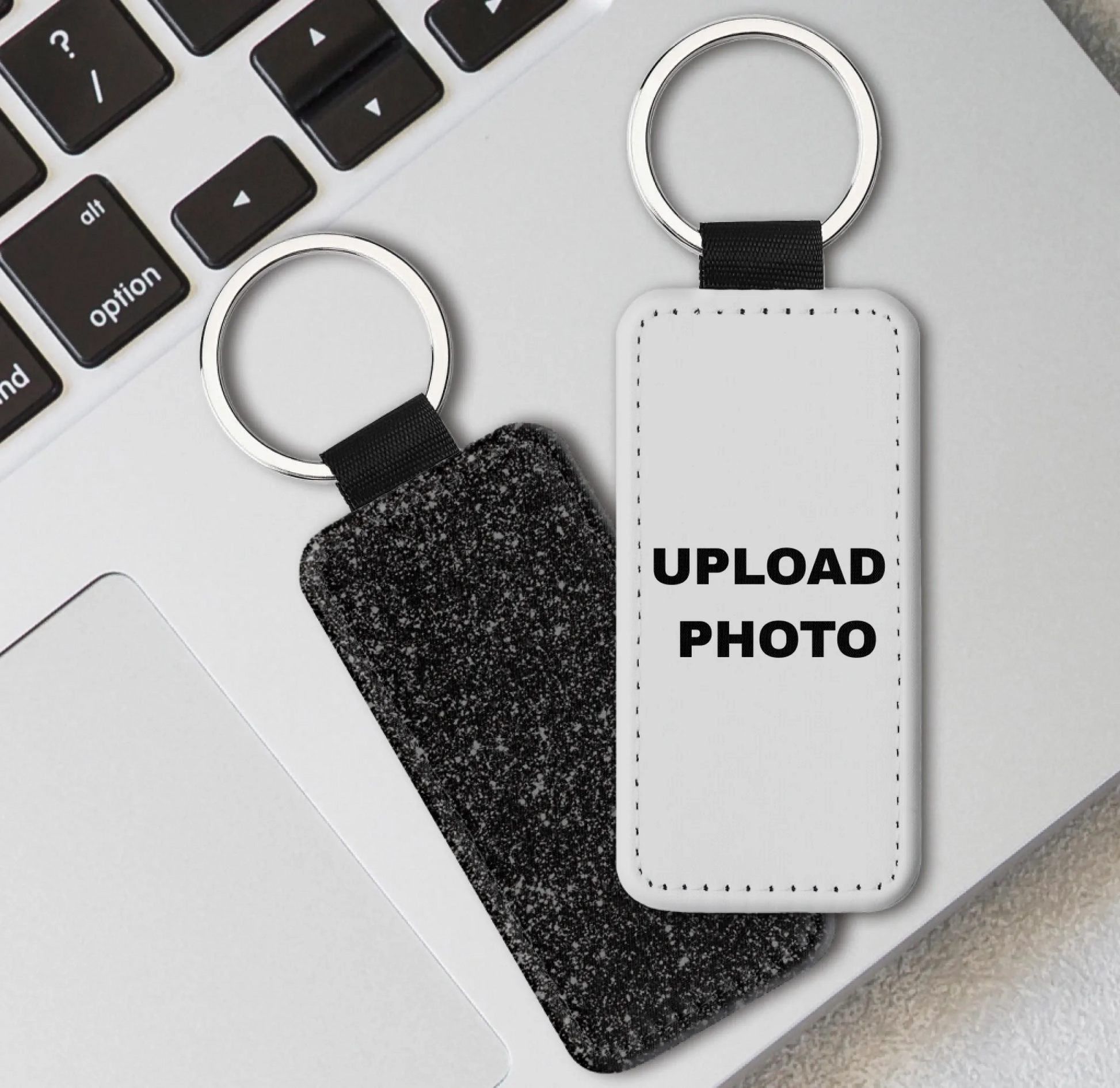 Black glitter rectangle PU leather keychain personalized with photos, logos, names, and artwork using full-color sublimation printing.