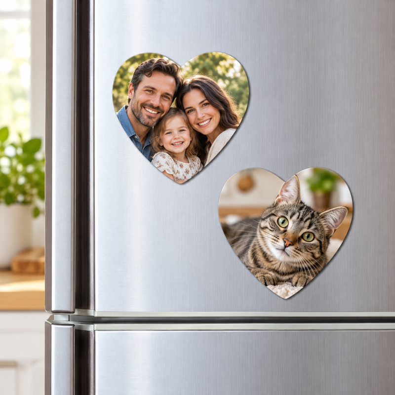 heart photo fridge magnets displaying a family portrait and tabby cat on a refrigerator