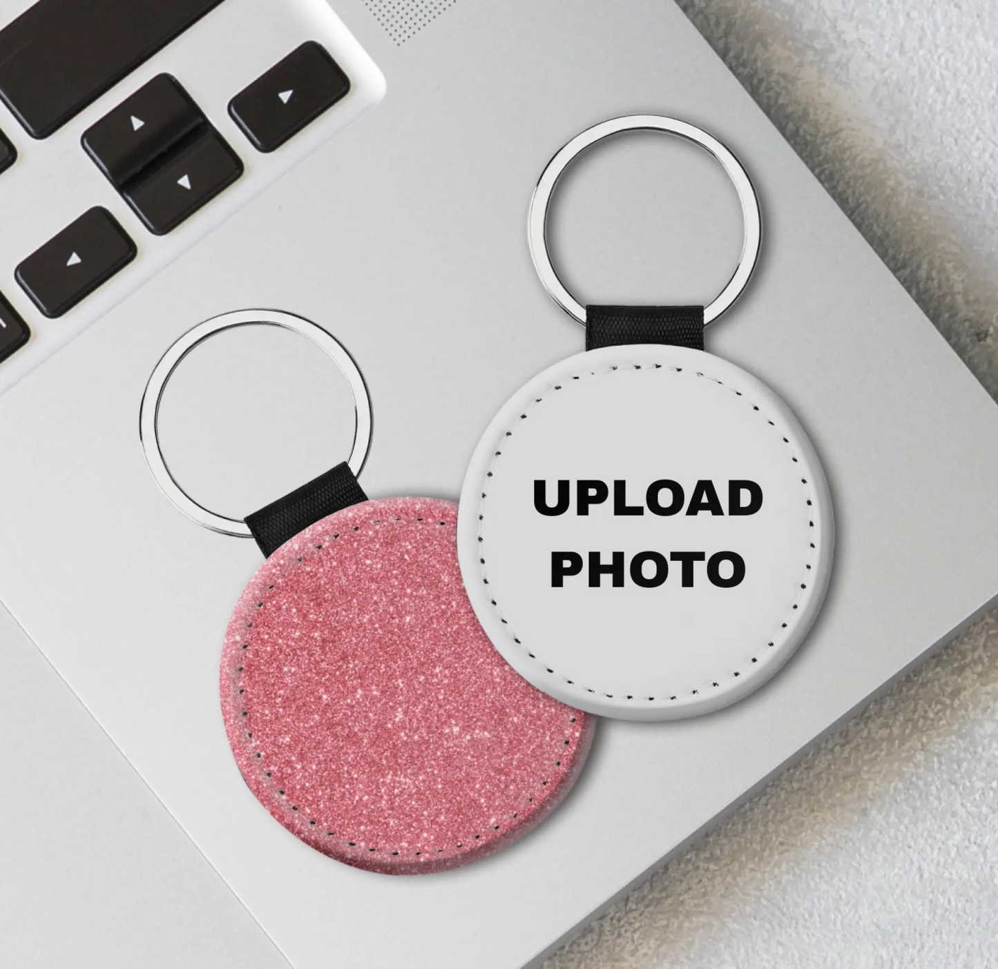 Pink glitter PU leather circle keychain customized with sublimation printing for personalized gifts, businesses, and events.