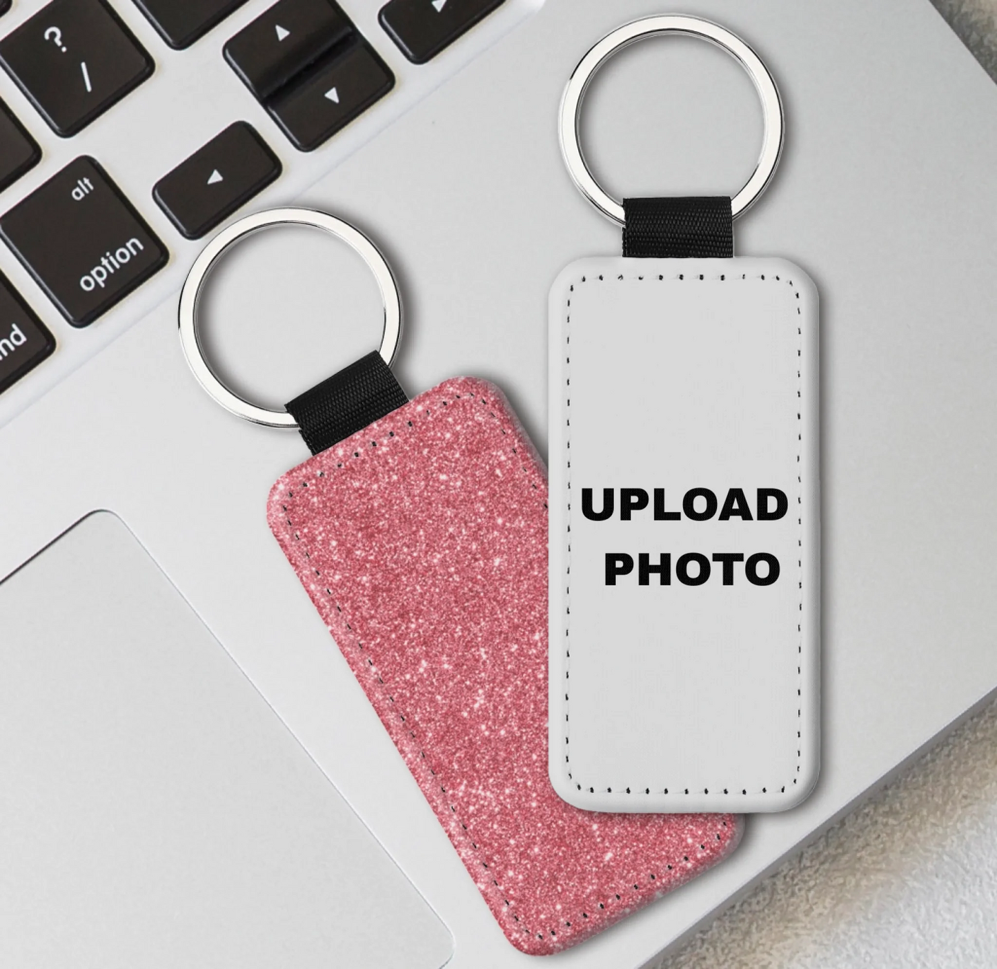 Pink glitter rectangle PU leather keychain personalized with photos, logos, names, and artwork.