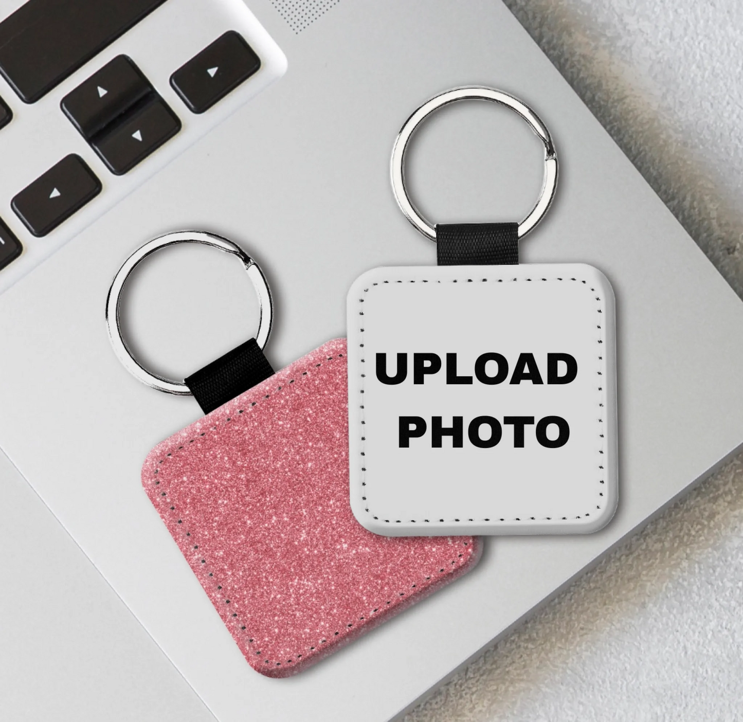Pink glitter square PU leather keychain personalized with photos, logos, names, and artwork.