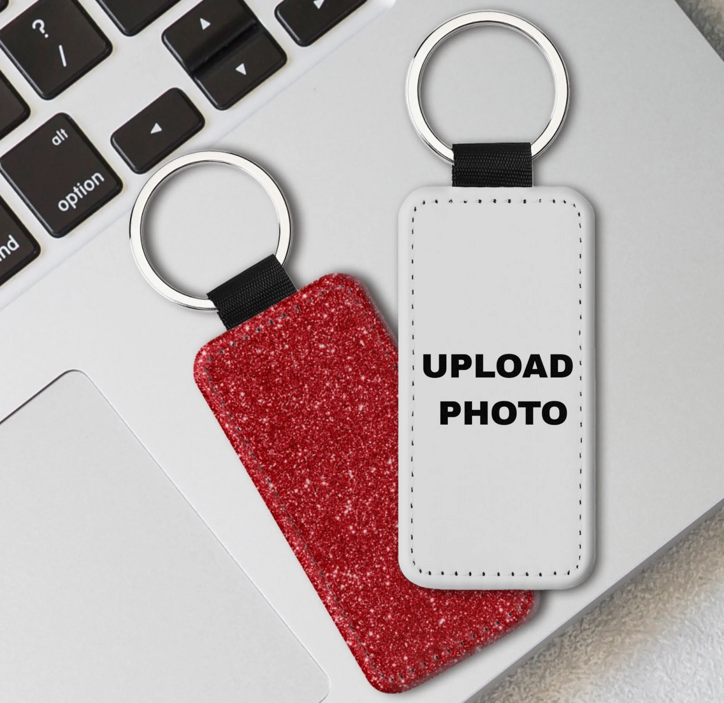 Red glitter rectangle PU leather keychain customized with full-color logos, photos, names, and artwork.