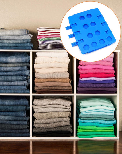 Folded blue shirt folding board with neatly stacked clothes